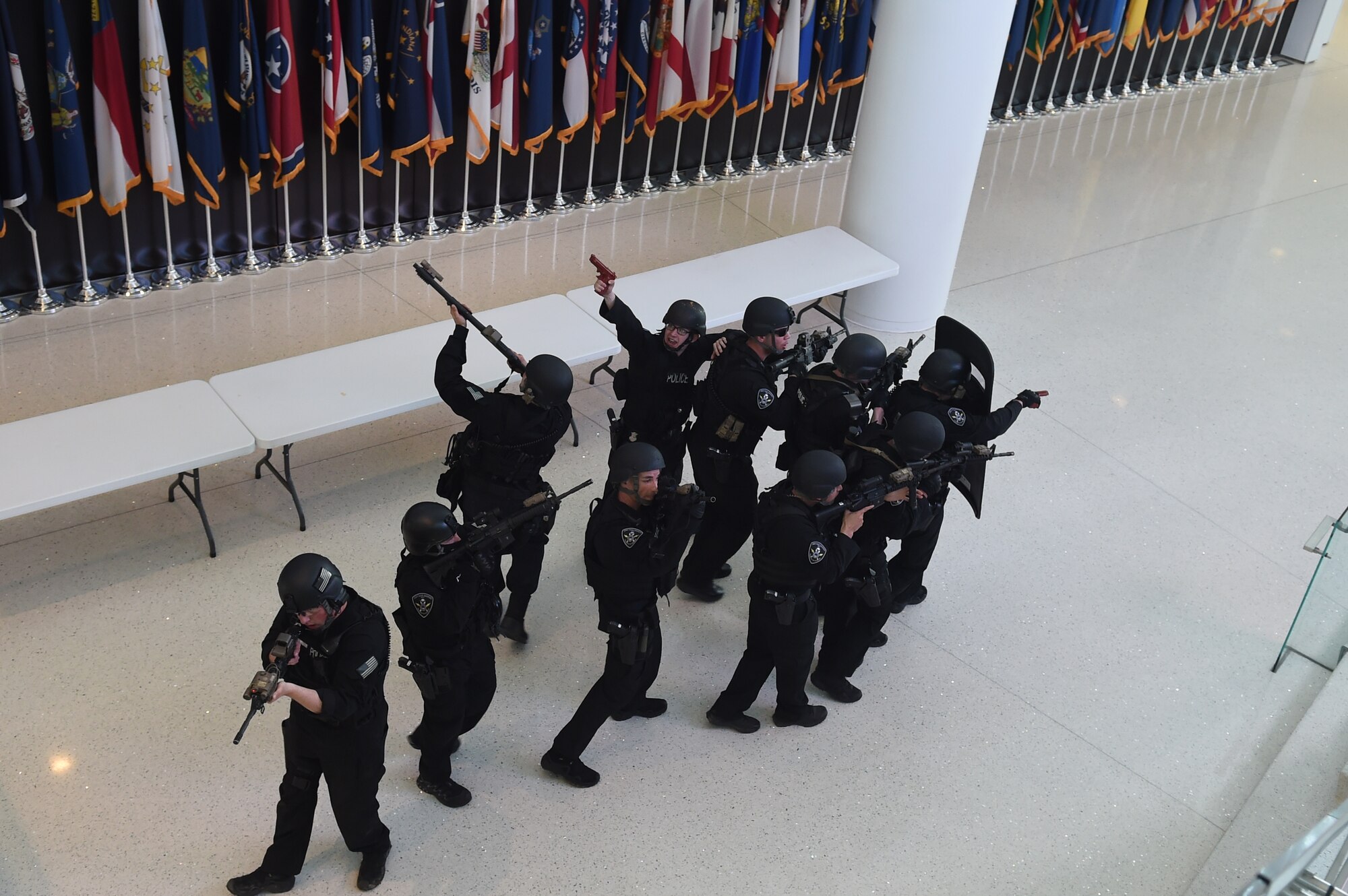Airmen from the 11th Security Forces Squadron Emergency Services Team at Joint Base Andrews, Md., clear the Air National Guard Readiness Center during an active shooter exercise March 9, 2016. Conducting exercises like these help test installation personnel on the knowledge, skills, abilities and mindset necessary to successfully respond to an active shooter event. (U.S. Air Force photo by Senior Airman Mariah Haddenham/Released)
