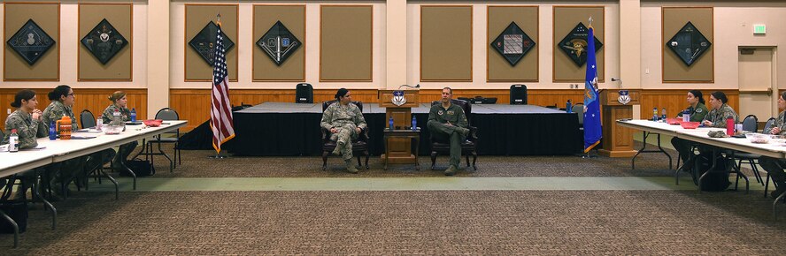 Lt. Col. Mark Nemish, 490th Missile Squadron director of operations, and his wife, Lt. Col. Kristen Nemish, 10th Missile Squadron commander, speak on the obstacles of being a military member and married to another military member at the first ever women’s symposium at Malmstrom Air Force Base, Mont., March 8, 2016. The speakers at the conference were composed of military and civilian leaders from across the Great Falls community. (U.S. Air Force photo/Senior Airman Jaeda Tookes)