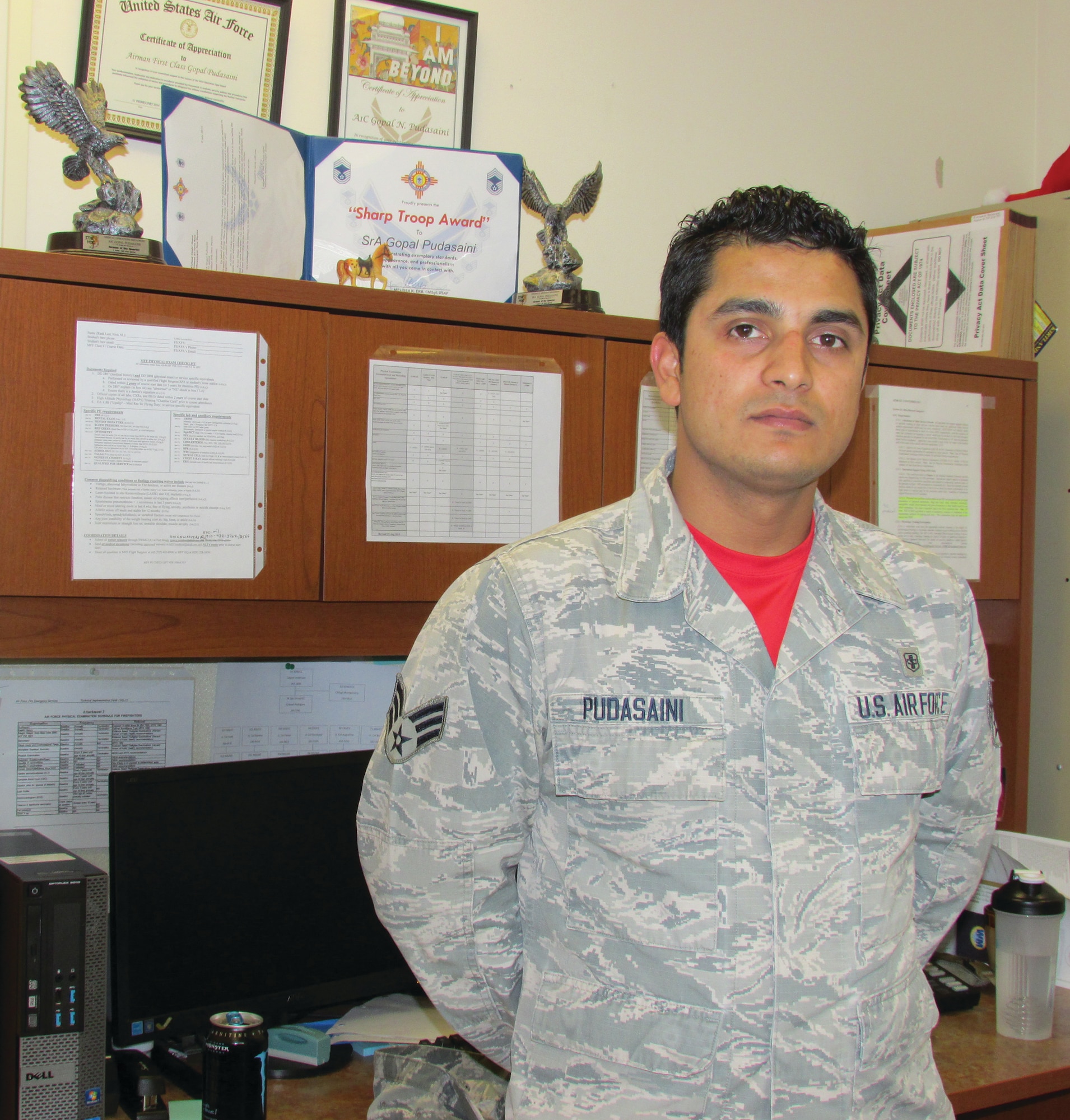 Senior Airman Gopal Pudasaini, an aerospace medicine technician with the 377th Medical Group, is worried about his sister in Nepal and her two children, whose home and livelihood were destroyed by an earthquake last year. His co-workers have started a GoFundMe campaign to raise money for a house, hoping to have at least the foundation done before the monsoon season. (Photo by Argen Duncan)