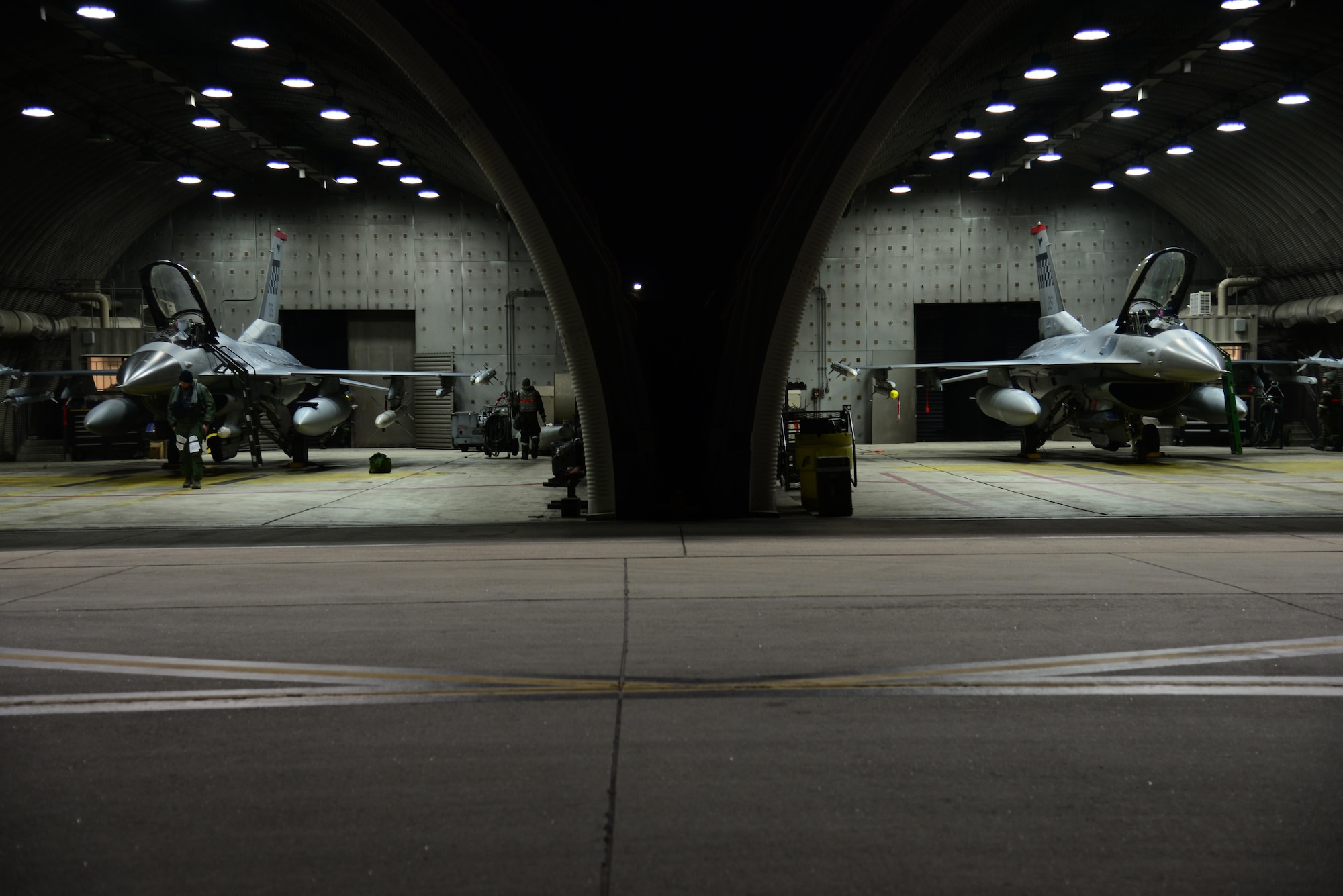 Airmen from the 36th Fighter Squadron and 36th Aircraft Maintenance Unit prepare F-16 Fighting Falcons for the first simulated combat sorties of Beverly Midnight 16-01 at Osan Air Base, Republic of Korea March 9, 2016. Team Osan is participating in the exercise which is designed to test American forces in the ROK on their mission readiness in the event of an emergency or wartime environment. (U.S. Air Force photo by Staff Sgt. Rachelle Coleman/Released)