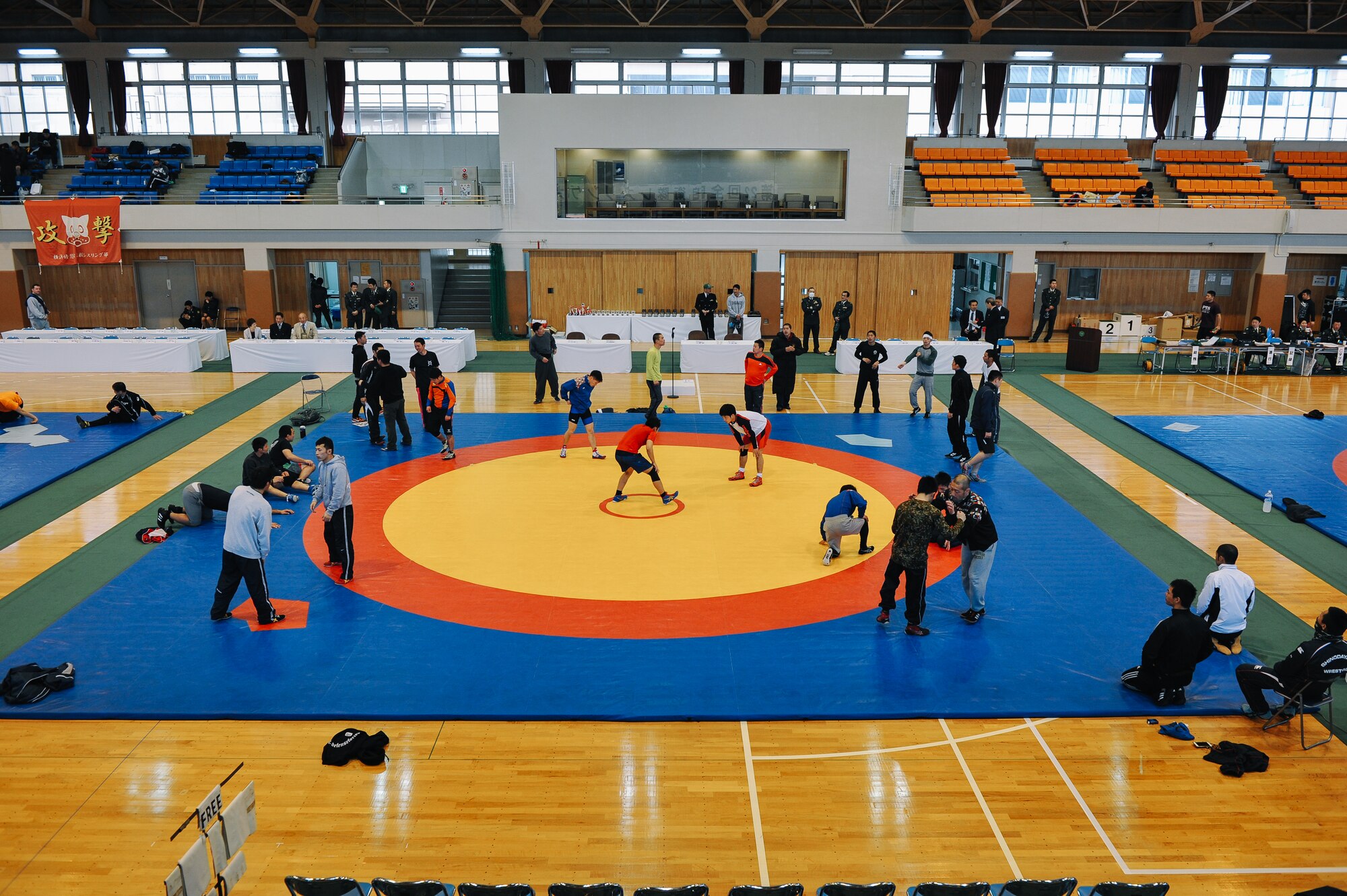 Participants of the Japan Ground Self-Defense Force All Japan Masters Wrestling Games warm up before official matches, March 5, 2016, at Camp Asaka, Japan. The two-day event featured double elimination individual and single elimination team tournaments. (U.S. Air Force photo by Airman 1st Class Delano Scott/Released) 