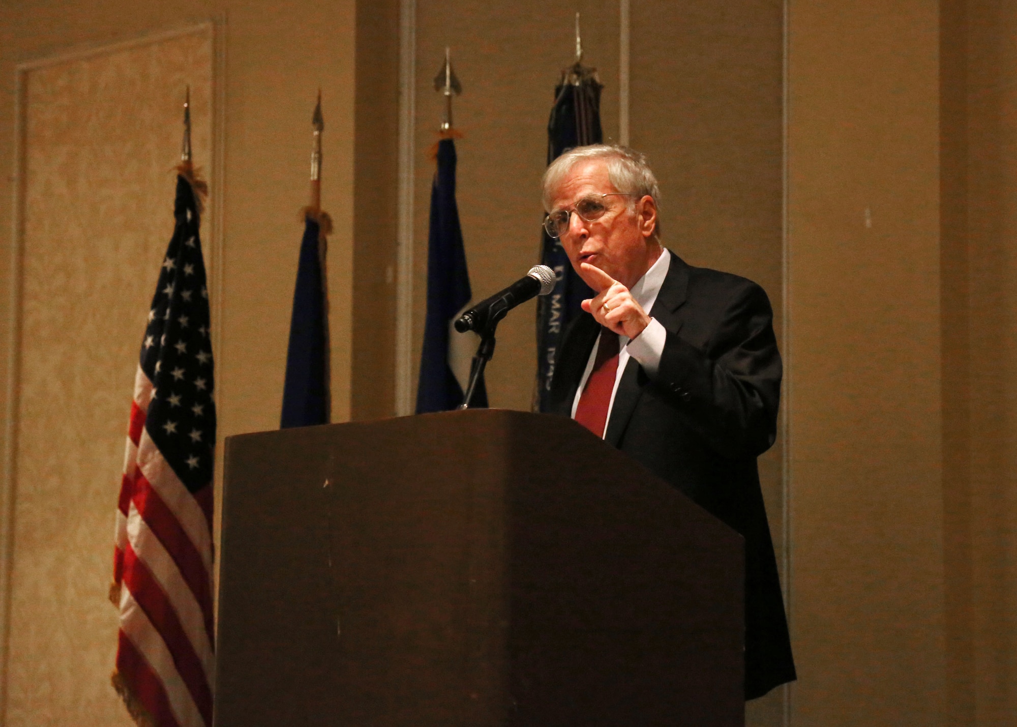 U.S. Air Force General (Ret.) Robert H. “Doc” Fogelsong speaks to the Airmen and civilians of the 310th Space Wing March 4, 2016, at the Antlers Hilton in Colorado Springs, Colo. Fogelsong was the guest speaker for the event, which recognized the wing’s annual award winners and brought unit Reservists together to enjoy an evening of esprit de corps, unit morale and camaraderie. (U.S. Air Force photo/Tech. Sgt. Sarah Corrice)