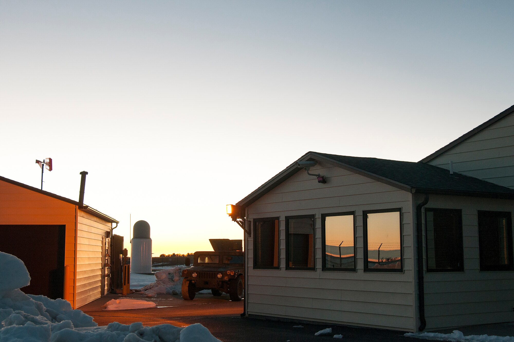 The sun rises at a Missile Alert Facility in the F.E. Warren Air Force Base, Wyo., missile complex, Feb. 9, 2016. MAFs house the missile crews who command Minuteman III ICBMs. (U.S. Air Force photo by Senior Airman Jason Wiese)
