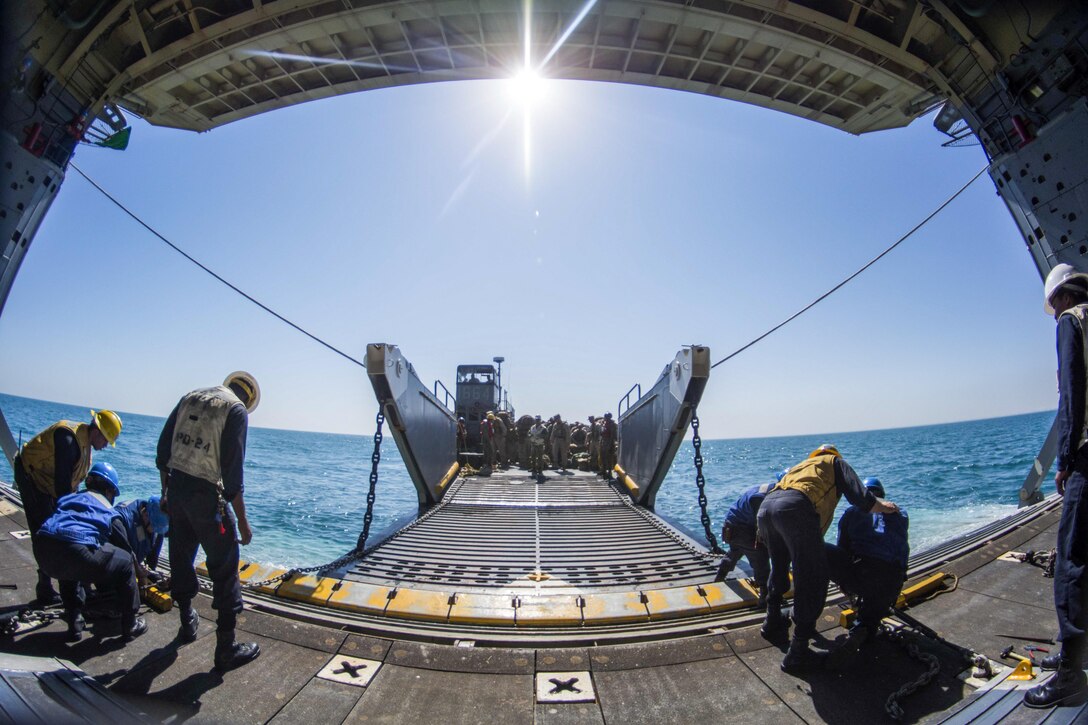 A U.S. landing craft performs a stern gate marriage with the USS Arlington as part of Amphibious Landing Exercise 2016 in the Arabian Gulf, March 1, 2016. The Navy and Marine Corps are conducting the amphibious and ground exercise with Kuwaiti forces. The Arlington is supporting maritime security operations and theater security cooperation efforts in the U.S. 5th Fleet area of operations. Navy photo by Petty Officer 2nd Class Stevie Tate