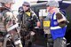 Master Sgt. Shane Christian, 51st Fighter Wing occupational safety manager, middle, and Senior Master Sgt. Sean Rouillier, 51st FW superintendent of safety, right, speak with Senior Airman Jared Lozier, 51st Security Forces Squadron patrolman, left, March 10, 2016, at Osan Air Base, Republic of Korea. During Exercise Beverly Midnight 16-01, the main goal of the base safety office is eliminating the myriad of problems that can occur due to the added stresses of an exercise. (U.S. Air Force photo by Staff Sgt. Benjamin Sutton/Released)