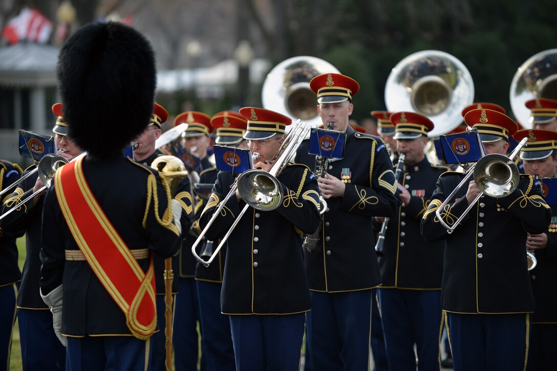 The U.S. Army Band performs before Canadian Prime Minister Justin Trudeau's arrival at the White Houise, March 10, 2016. In addition to the Army Band, the event included Honor Guard members from the U.S. Army, Air Force, Marine Corps and Coast Guard. Trudeau's visit is the first from a visiting Canadian prime minister in 19 years. Air National Guard photo by Staff Sgt. Christopher S. Muncy