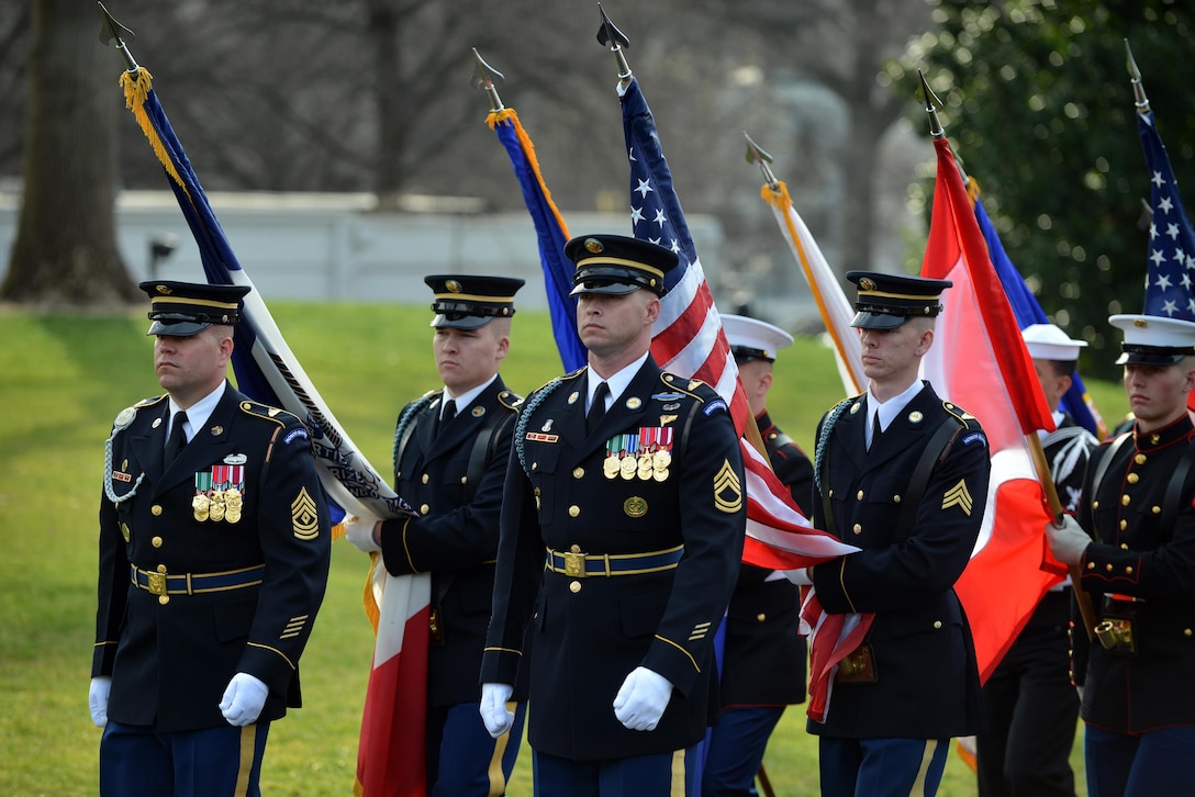 Service members from the U.S. Army, Air Force, Marines Corps, Navy and Coast Guard participate in the welcome ceremony for Canadian Prime Minister Justin Trudeau's arrival at the White House, March 10, 2016. Air National Guard photo by Staff Sgt. Christopher S. Muncy