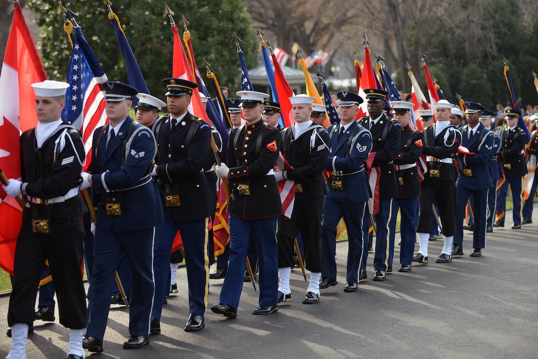 Service members from the U.S. Army, Air Force, Marines Corps, Navy and Coast Guard participate in the welcome ceremony for Canadian Prime Minister Justin Trudeau's arrival at the White House, March 10, 2016. Air National Guard photo by Staff Sgt. Christopher S. Muncy