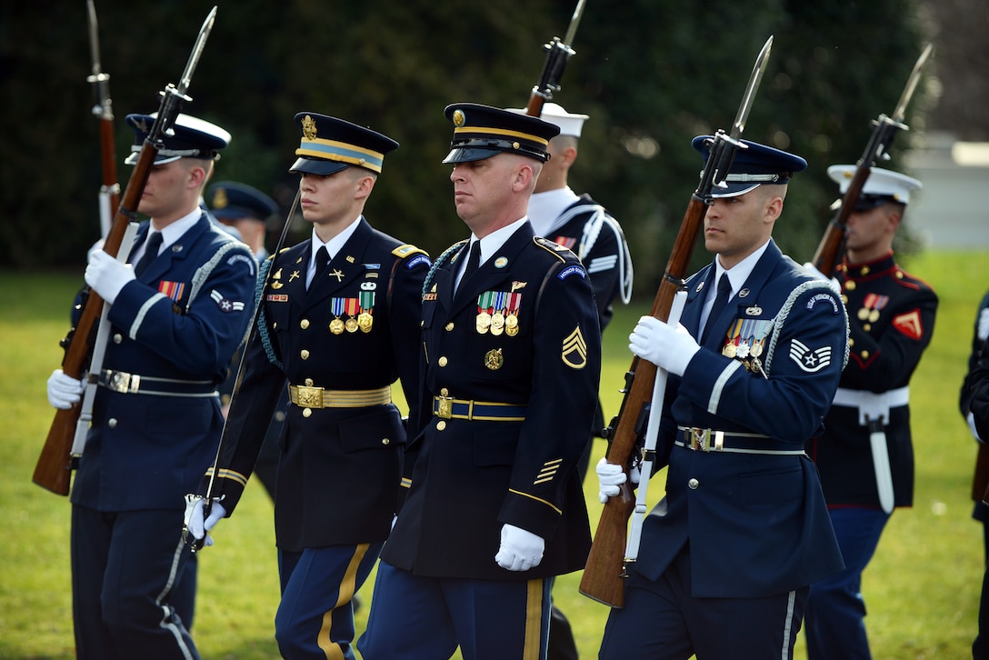 Service members from the U.S. Army, Air Force, Marines Corps, Navy and Coast Guard participate in the welcome ceremony for the arrival of Canadian Prime Minister Justin Trudeau at the White House, March 10, 2016. Air National Guard photo by Staff Sgt. Christopher S. Muncy