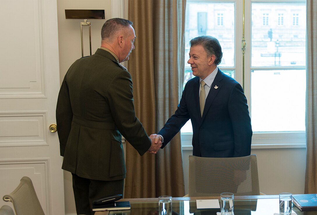Marine Corps Gen. Joseph F. Dunford Jr., chairman of the Joint Chiefs of Staff, meets with Colombian President Juan Manuel Santos at the Palacio de Narino in Bogota, Colombia, March 10, 2016. DoD photo by Navy Petty Officer 2nd Class Dominique A. Pineiro