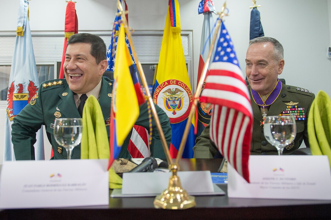 Marine Corps Gen. Joseph F. Dunford Jr., chairman of the Joint Chiefs of Staff, right, shares a light moment during a working lunch with Gen. Juan Pablo Rodriguez, commander of Colombia's armed forces, in Bogota, Colombia, March 10, 2016. DoD Photo by Navy Petty Officer 2nd Class Dominique A. Pineiro