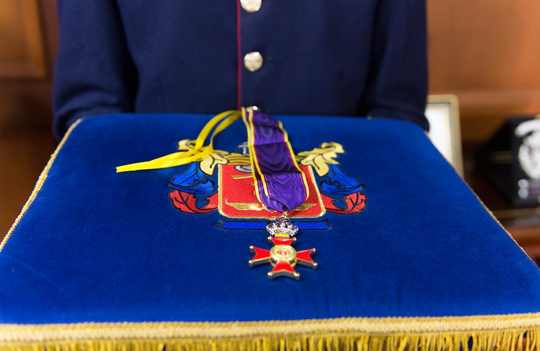 The Fe en la Causa medal sits on a table before a ceremony in which Gen. Juan Pablo Rodriguez, commander of Colombia's armed forces, presented the medal to Marine Corps Gen. Joseph F. Dunford Jr., chairman of the Joint Chiefs of Staff, in Bogota, Colombia, March 10, 2016. Dunford received the medal for his support of Colombian military efforts. DoD photo by Navy Petty Officer 2nd Class Dominique A. Pineiro