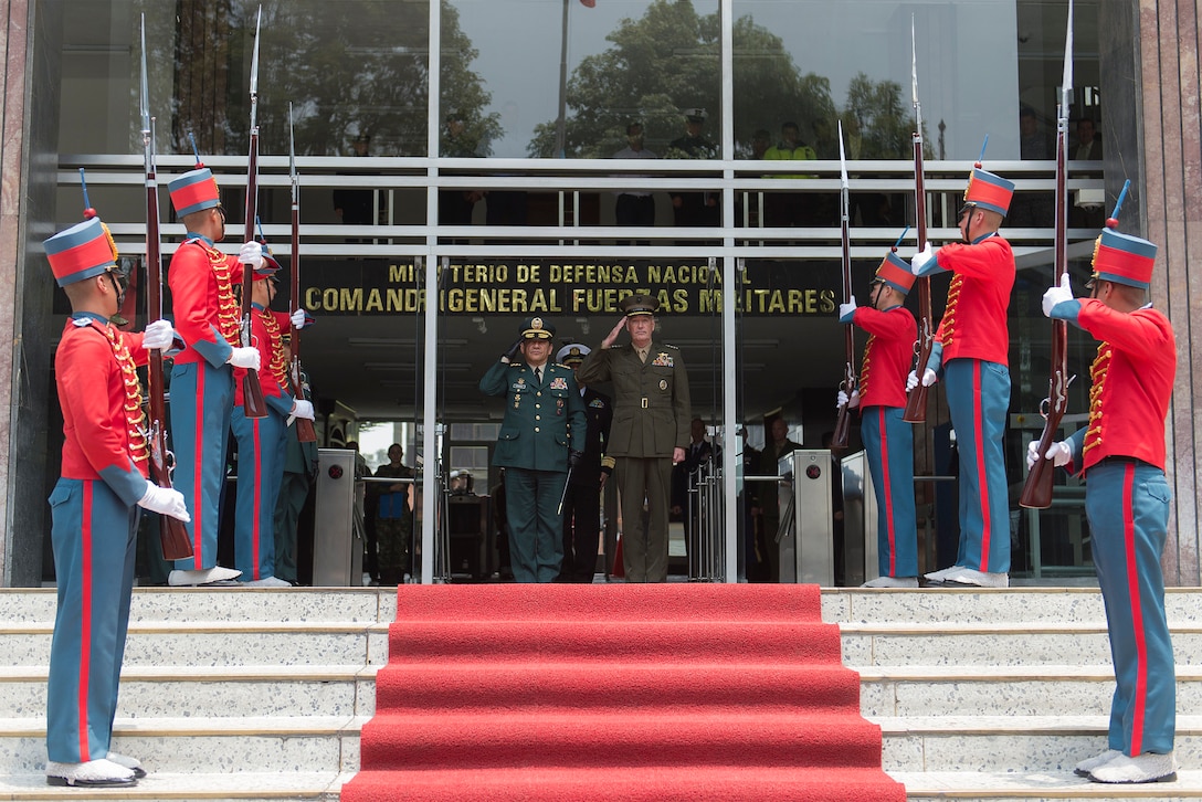 Colombian service members render honors to Marine Corps Gen. Joseph F. Dunford Jr., chairman of the Joint Chiefs of Staff, right, and Gen. Juan Pablo Rodriguez, commander of Colombia's armed forces, as they arrive at military headquarters in Bogota, Colombia, March 10, 2016. Dunford met with senior U.S. and Colombian military and civilian leaders during his first visit to Colombia as chairman. DoD photo by Navy Petty Officer 2nd Class Dominique A. Pineiro