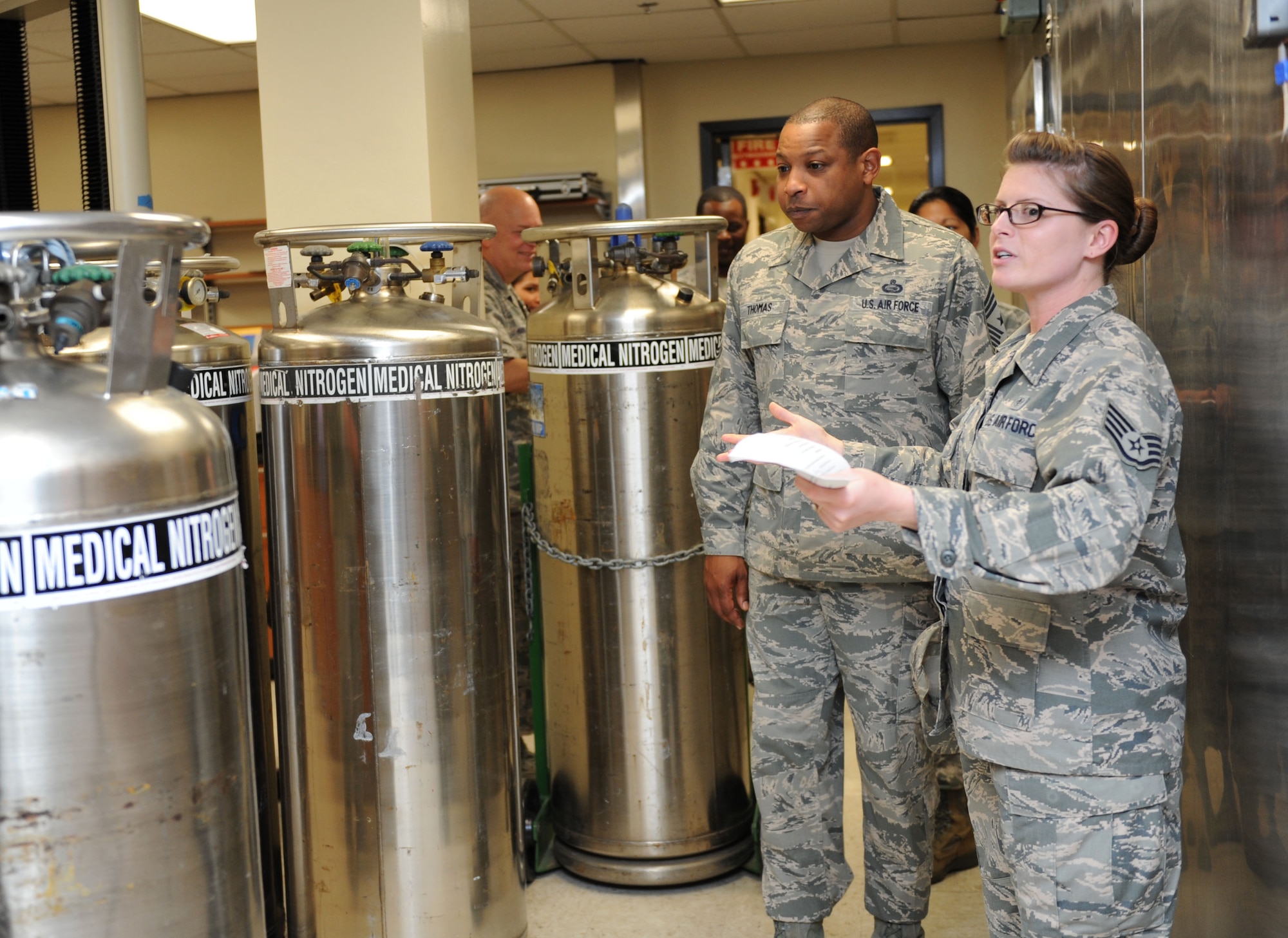 Chief Master Sgt. Farrell Thomas, 2nd Air Force command chief, receives a tour of the clinical research lab from Staff Sgt. Mandy Polen, 81st Medical Support Squadron clinical research laboratory NCO in charge, during an immersion tour Mar.8, 2016, Keesler Air Force Base, Miss. Thomas visited the 81st Medical Group to become oriented with group missions, operations and personnel. (U.S. Air Force photo by Kemberly Groue)