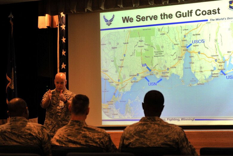 Col. Thomas Harrell, 81st Medical Group commander, briefs Chief Master Sgt. Farrell Thomas, 2nd Air Force command chief, during an immersion tour at the Keesler Medical Center Mar.8, 2016, Keesler Air Force Base, Miss. Thomas visited the 81st MDG to become oriented with group missions, operations and personnel. (U.S. Air Force photo by Kemberly Groue) 