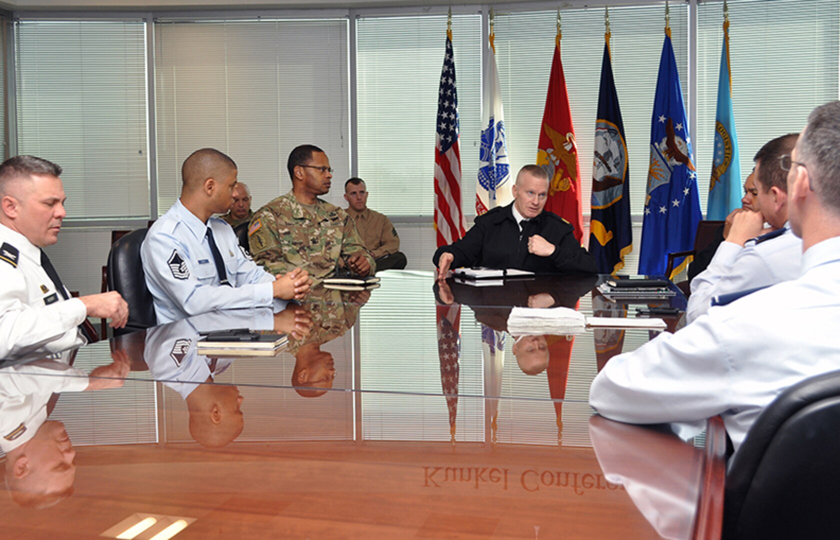Army Command Sgt. Maj. John Wayne Troxell, the senior enlisted advisor to the Chairman of the Joint Chiefs of Staff, talks to DLA Energy personnel during a meeting at the McNamara Headquarters Complex in Fort Belvoir, Virginia, March 8.