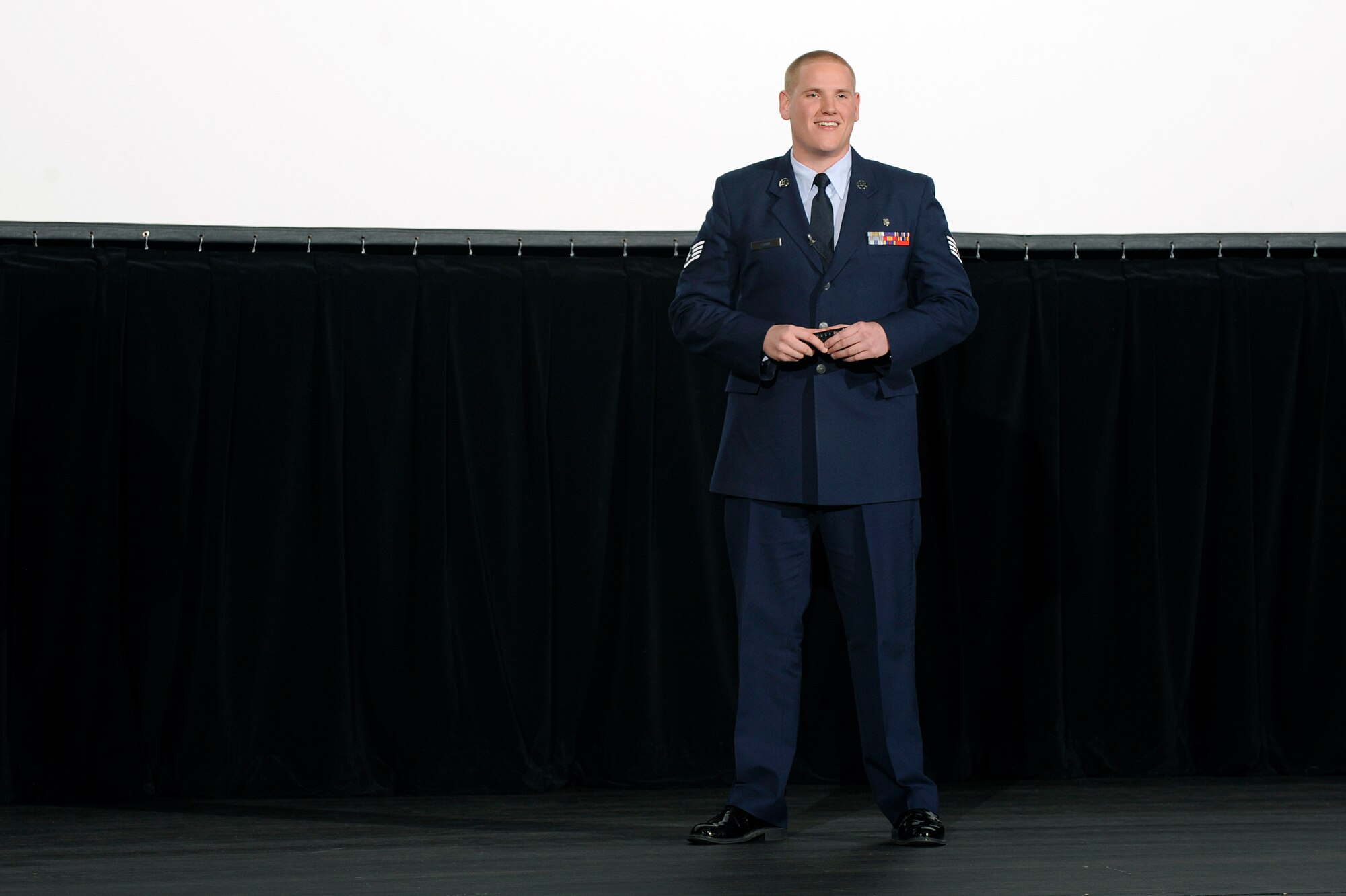 Staff Sgt. Spencer Stone, one of three U.S. citizens who thwarted a terrorist attack on a train bound for Paris last year, speaks onstage at Arnold Hall during the National Character and Leadership Symposium at the U.S. Air Force Academy Feb. 25-26, 2016. Spencer told the audience of cadets and Academy staff members they will experience an unexpected moment in their lives when their leadership abilities will be tested. (U.S. Air Force photo/Jason Gutierrez)