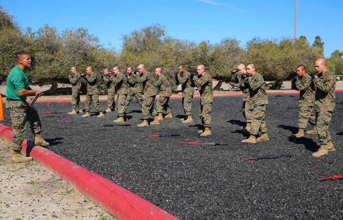 Recruits of Delta Company, 1st Recruit Training Battalion, conduct a counter attack during a Marine Corps Martial Arts Program Test and Marine Corps Recruit Depot San Diego, March 9. Twenty recruits at a time took the test as the instructors evaluated them. The recruits also conducted hand-to-hand combat techniques and learned various movements with knives and rifles. Annually, more than 17,000 males recruited from the Western Recruiting Region are trained at MCRD San Diego. Delta Company is scheduled to graduate April 1.