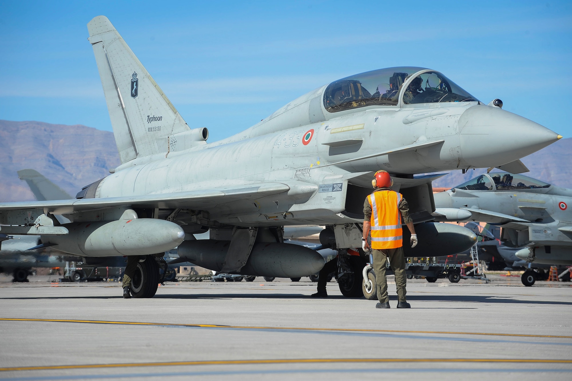 An Italian air force Eurofighter Typhoon from the 4th Fighter Wing, Grosseto, Italy, conducts pre-flight checks in preparation for take-off during Red Flag 16-2 March 3, 2016 at Nellis Air Force Base, Nev., for Red Flag 16-2. It is the first time the Eurofighter Typhoon from the Italian air force is participating. (U.S. Air Force photo by Senior Airman Jake Carter)