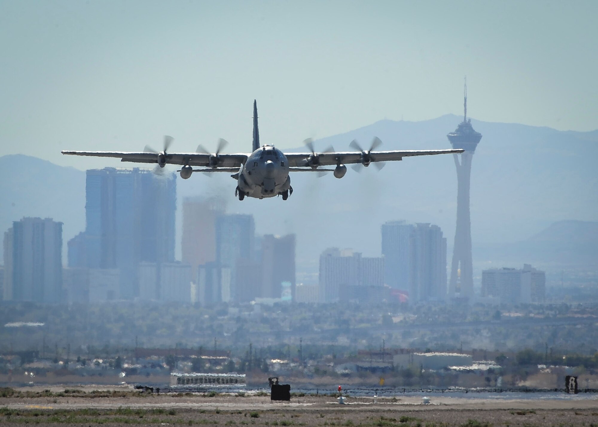 A C-130H3 from the 700th Airlift Squadron, Dobbins Air Reserve Base, Ga., takes off from the flightline at Nellis Air Force Base, Nev., during a training mission during Red Flag 16-2 Feb. 29, 2016. During the two week exercise, units from around the world work on integration to better themselves for future operations. (U.S. photo by Senior Airman Jake Carter)