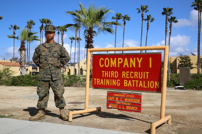 Private First Class John P. Cash, India Company, 3rd Recruit Training Battalion, stands next to his squad bay at Marine Corps Recruit Depot San Diego, March 7. Following recruit training, Cash will continue his schooling at Marine Combat Training in Marine Corps Base Camp Pendleton, Calif., and then on to his military occupational specialty school to learn his profession of communications. Today, all male recruits recruited from recruiting stations west of the Mississippi are trained at MCRD San Diego. The depot is responsible for training more than 16,000 recruits annually. India Company graduated recruit training March 11.