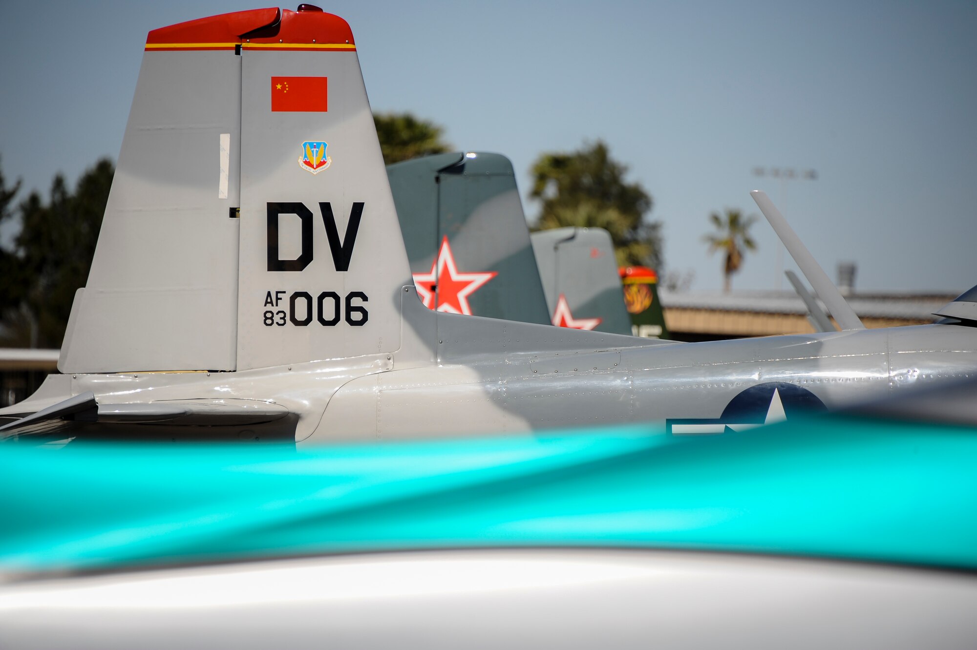 The CJ-6 Desert Rats sit on the flightline at the Ryan Airfield in Tucson, Ariz., March 10, 2016. The Desert Rats will be performing aerial demonstrations during the upcoming Thunder and Lightning over Arizona Open House. (U.S. Air Force photo by Airman 1st Class Mya M. Crosby/Released)