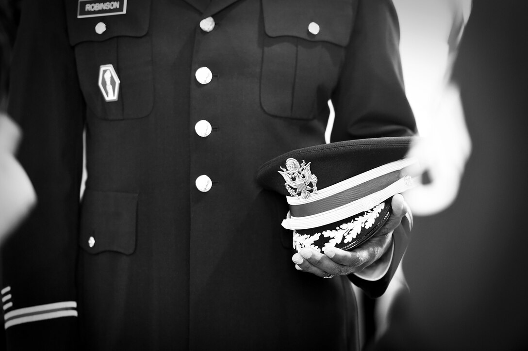 An Army Reserve soldier holds his service cap during a memorial service for Army Spc. Adriana Salem at the Memory Gardens cemetery in Arlington Heights, Ill., March 4, 2016. Sandra Salem, mother of Salem, held the memorial on the 11th anniversary of her daughter’s death. Attendees included Congresswoman Tammy Duckworth, former Illinois governor Patrick Quinn, Illinois Patriot Guard, and Army Reserve soldiers from the 85th Support Command and 85th Army Band. Salem, assigned to the 3rd Infantry Division, was killed in Remagen, Iraq on March 4, 2005.
(U.S. Army photo by Mr. Anthony L. Taylor/Released)
