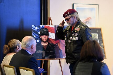 David “Big Dave” Gier, Senior Ride Captain Region 1, Illinois Patriot Guard, renders a salute to the American Flag, after presenting it to Sandra Salem, mother of Army Spc. Adriana Salem, during a memorial service for Spc. Salem at the Memory Gardens cemetery in Arlington Heights, Ill., March 4, 2016. Salem held the memorial on the 11th anniversary of her daughter’s death. Attendees included Congresswoman Tammy Duckworth, former Illinois governor Patrick Quinn, Illinois Patriot Guard, and Army Reserve soldiers from the 85th Support Command and 85th Army Band. Spc. Salem, assigned to the 3rd Infantry Division, was killed in Remagen, Iraq on March 4, 2005.
(U.S. Army photo by Mr. Anthony L. Taylor/Released)

