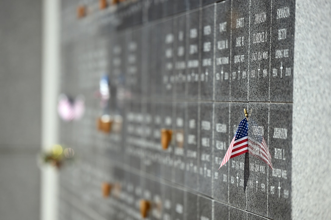 An American Flag lies placed in a veterans’ memorial wall at the Memory Gardens cemetery in Arlington Heights, Ill., March 4, 2016. A memorial service for Army Spc. Adriana Salem was held there, coordinated by her mother, for the 11th anniversary of Salem’s death. Attendees included Congresswoman Tammy Duckworth, former Illinois governor Patrick Quinn, Illinois Patriot Guard, and Army Reserve soldiers from the 85th Support Command and 85th Army Band. Salem, assigned to the 3rd Infantry Division, was killed in Remagen, Iraq on March 4, 2005.
(U.S. Army photo by Mr. Anthony L. Taylor/Released)

