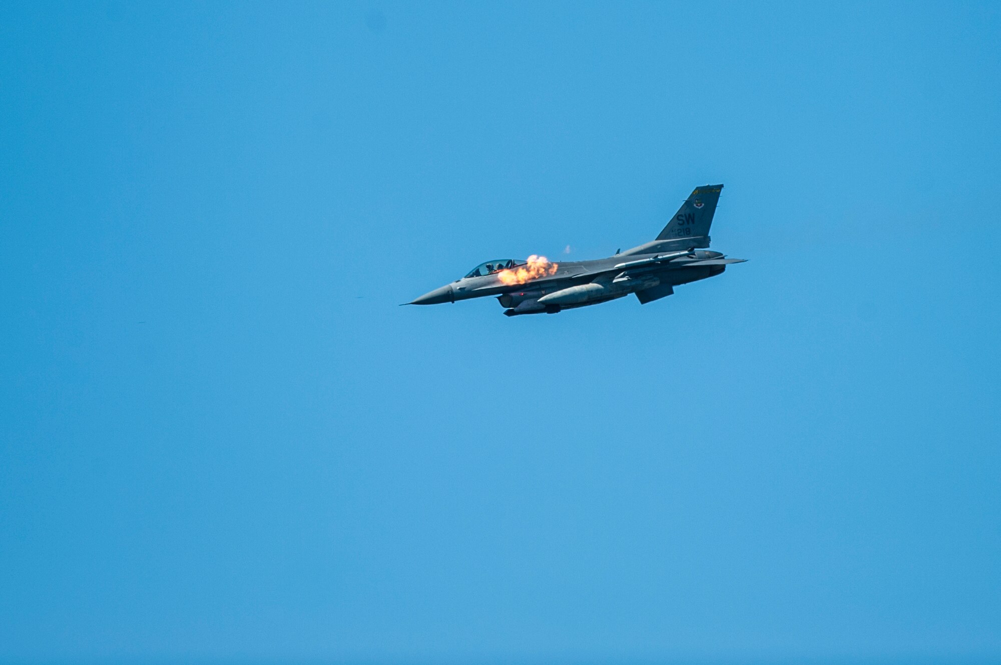 An F-16 Fighting Falcon fires at a target during a training exercise, Feb.18, 2016, at Moody Air Force Base, Ga. During the training, the aircraft conducted tactical air and ground maneuvers, as well as weapons training. (U.S. Air Force photo by Airman 1st Class Lauren M. Johnson/Released)