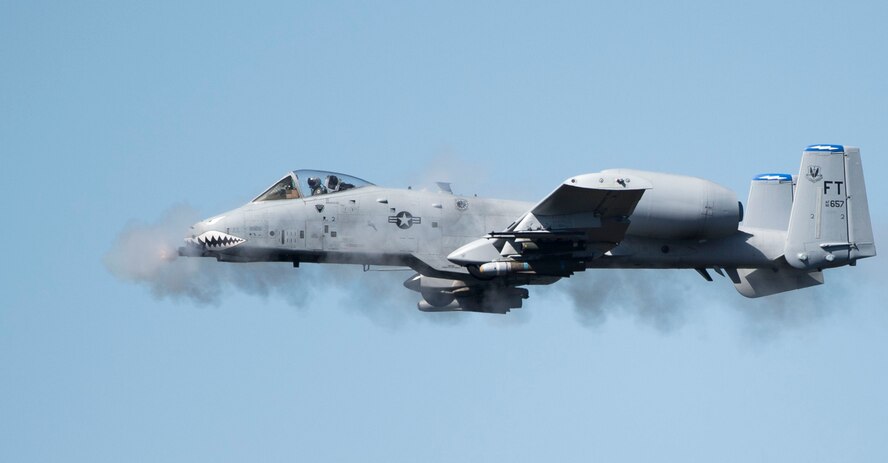 An A-10 Thunderbolt II fires the GAU-8 Avenger, a 30mm Gatling-style canon, over the Grand Bay Bombing and Gunnery Range at Moody Air Force Base, Ga., Feb. 11, 2016. Multiple U.S. Air Force aircraft within Air Combat Command conducted joint aerial training that showcased the aircrafts tactical air and ground maneuvers, as well as its weapons capabilities. (U.S. Air Force photo by Staff Sgt. Brian J. Valencia/Released)