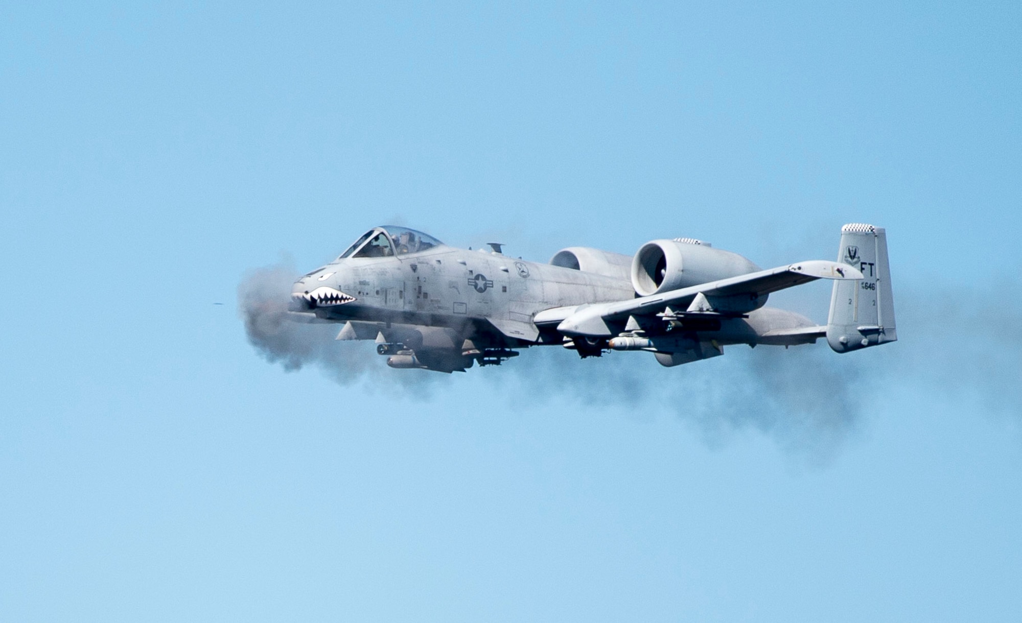 An A-10 Thunderbolt II fires the GAU-8 Avenger, a 30mm Gatling-style canon, over the Grand Bay Bombing and Gunnery Range at Moody Air Force Base, Ga., Feb. 11, 2016. Multiple U.S. Air Force aircraft within Air Combat Command conducted joint aerial training that showcased the aircrafts tactical air and ground maneuvers, as well as its weapons capabilities. (U.S. Air Force photo by Staff Sgt. Brian J. Valencia/Released)