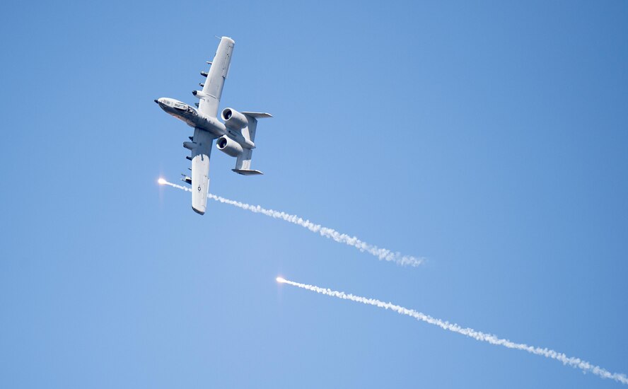 An A-10 Thunderbolt II releases flares over Grand Bay Bombing and Gunnery Range at Moody Air Force Base, Ga., Feb. 18, 2016. Multiple U.S. Air Force aircraft within Air Combat Command conducted joint combat rescue and aerial training that showcased the aircrafts tactical air and ground maneuvers, as well as its weapons capabilities. (U.S. Air Force photo by Staff Sgt. Brian J. Valencia/Released)