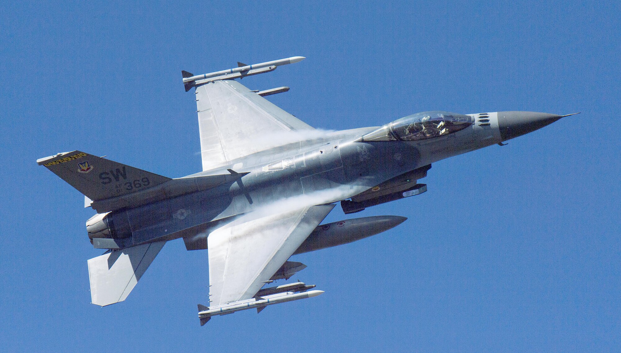 An F-16 Fighting Falcon flies over Grand Bay Bombing and Gunnery Range at Moody Air Force Base, Ga., Feb. 18, 2016. Multiple U.S. Air Force aircraft within Air Combat Command conducted joint aerial training that showcased the aircrafts tactical air and ground maneuvers, as well as its weapons capabilities. (U.S. Air Force photo by Staff Sgt. Brian J. Valencia/Released)