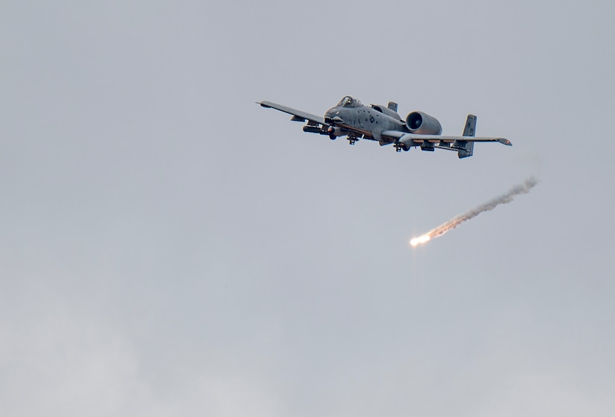 An A-10 Thunderbolt II releases flares over Grand Bay Bombing and Gunnery Range at Moody Air Force Base, Ga., Mar. 4, 2016. Multiple U.S. Air Force aircraft within Air Combat Command conducted joint aerial training that showcased the aircrafts tactical air and ground maneuvers, as well as its weapons capabilities. (U.S. Air Force photo by Staff Sgt. Brian J. Valencia/Released)