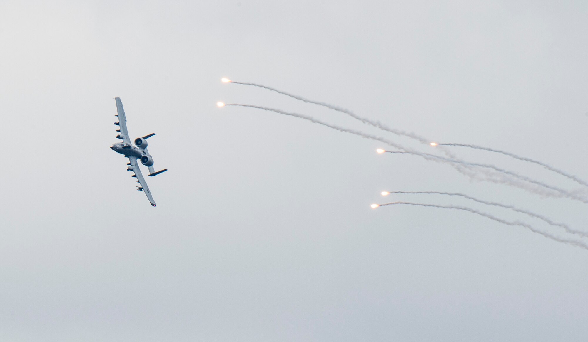 An A-10 Thunderbolt II releases flares over Grand Bay Bombing and Gunnery Range at Moody Air Force Base, Ga., Feb. 18, 2016. Multiple U.S. Air Force aircraft within Air Combat Command conducted joint aerial training that showcased the aircrafts tactical air and ground maneuvers, as well as its weapons capabilities. (U.S. Air Force photo by Staff Sgt. Brian J. Valencia/Released)