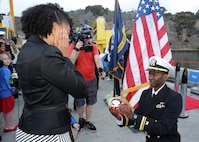 SAN DIEGO (December 18, 2013)  Lt.j.g. Justin Gay proposes to his girlfriend Cynthia Fambro following the return of the Los Angeles-class attack submarine USS USS Hampton (SSN 767) to Naval Base Point Loma after completing a six-month deployment to the western Pacific region. U.S. Navy photo by Mass Communication Specialist 2nd Class Kyle Carlstrom (Released)