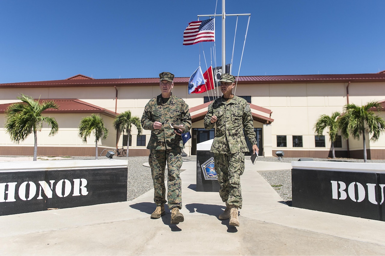 Marine Corps Gen. Joseph F. Dunford Jr., chairman of the Joint Chiefs of Staff, left, visits Joint Task Force Guantanamo, Cuba, March 9, 2016, to observe the detention facility and talk with service members who support the mission. DoD photo by Navy Petty Officer 2nd Class Dominique A. Pineiro
