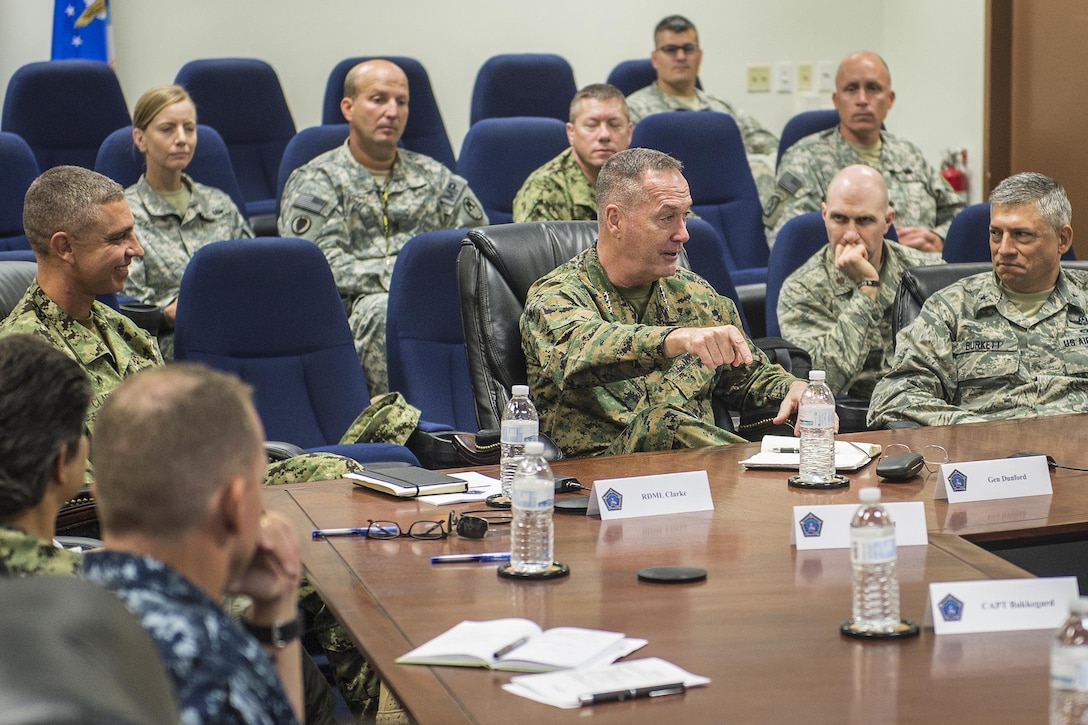 Marine Corps Gen. Joseph F. Dunford Jr., chairman of the Joint Chiefs of Staff, center, meets with military leaders to learn about the detention facility and talk with service members who support the mission during a visit to Joint Task Force Guantanamo, Cuba, March 9, 2016. DoD photo by Navy Petty Officer 2nd Class Dominique A. Pineiro