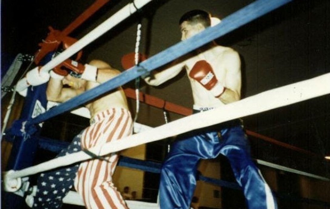 Lt. Col. Gregory Rooker, right, provost marshal for Marine Corps Air Station Miramar, fights in the 1995 International Sports Karate Association Welterweight Southeast U.S. Championship. Rooker holds a sixth-degree black belt in karate after 31 years of studying the style.
