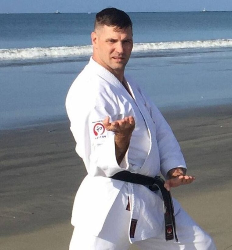 Lt. Col. Gregory Rooker, provost marshal for Marine Corps Air Station Miramar, Calif., practices Wado-Ryu karate at Coronado Beach in San Diego, Calif. Rooker holds a sixth-degree black belt in karate after 31 years of studying the style.