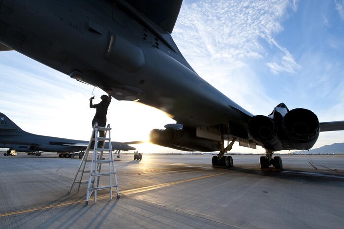 Staff Sgt. Joshua Free, a dedicated crew chief assigned to the 28th Aircraft Maintenance Squadron, Ellsworth Air Force Base, S.D., performs aircraft structure checks on a B-1 Lancer prior to a Red Flag 16-2 night training sortie March, 10, 2016 at Nellis Air Force Base, Nev. A high operations tempo presents an additional challenge faced by aircraft maintainers during Red Flag exercises, where consistent attention to detail is of vital importance. (U.S. Air Force photo by Senior Airman Joshua Kleinholz)