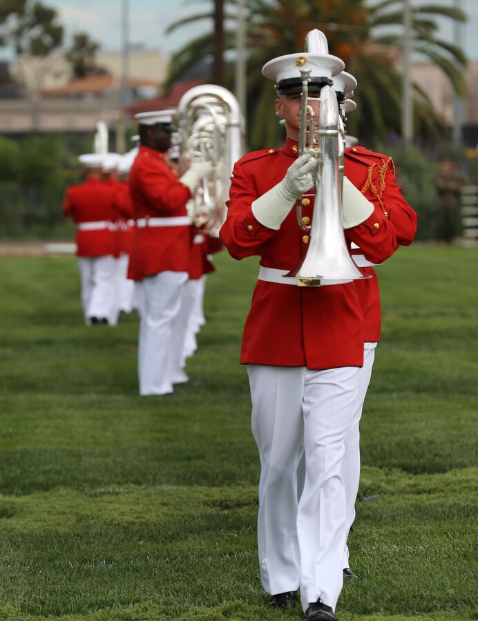 Marines with the United States Marine Drum and Bugle Corps, “the Commandant’s Own” perform during the Battle Color Ceremony aboard Marine Corps Air Station Miramar, Calif., March 11. The Battle Color Detachment is a ceremonial unit featuring the United States Marine Drum and Bugle Corps, the Silent Drill Platoon and the official Marine Corps Color Guard. “The Drum and Bugle Corps, and the Silent Drill Platoon puts on a fantastic show, ‘wows’ the crowd and represents the best the Marine Corps has to offer,” said Maj. Gen. Michael Rocco, commanding general of the 3rd Marine Aircraft Wing. The Battle Color Detachment is based out of Marine Barracks Washington, also known as “8th and I,” the oldest active post in the Marine Corps. The Marines in the detachment perform in hundreds of ceremonies across the country annually. (U.S. Marine Corps photo by Cpl. Kimberlyn Adams/Released)