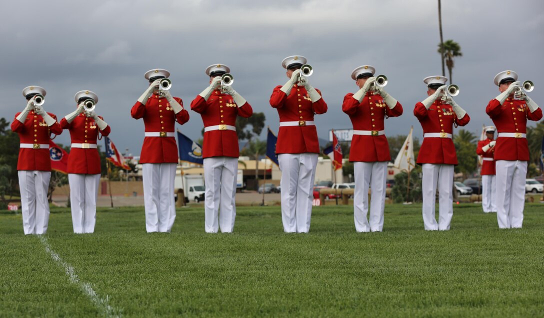 Marines with the United States Marine Drum and Bugle Corps, “the Commandant’s Own” perform during the Battle Color Ceremony aboard Marine Corps Air Station Miramar, Calif., March 11. The Battle Color Detachment is a ceremonial unit featuring the United States Marine Drum and Bugle Corps, the Silent Drill Platoon and the official Marine Corps Color Guard. “The Drum and Bugle Corps, and the Silent Drill Platoon puts on a fantastic show, ‘wows’ the crowd and represents the best the Marine Corps has to offer,” said Maj. Gen. Michael Rocco, commanding general of the 3rd Marine Aircraft Wing. The Battle Color Detachment is based out of Marine Barracks Washington, also known as “8th and I,” the oldest active post in the Marine Corps. The Marines in the detachment perform in hundreds of ceremonies across the country annually. (U.S. Marine Corps photo by Cpl. Kimberlyn Adams/Released)