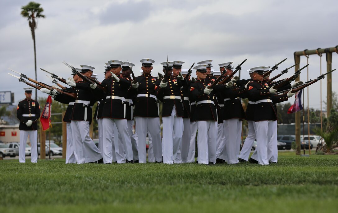 Marines with the Silent Drill Platoon perform during the Battle Color Ceremony aboard Marine Corps Air Station Miramar, Calif., March 11. The Battle Color Detachment is a ceremonial unit featuring the United States Marine Drum and Bugle Corps, the Silent Drill Platoon and the official Marine Corps Color Guard. “The Drum and Bugle Corps, and the Silent Drill Platoon puts on a fantastic show, ‘wows’ the crowd and represents the best the Marine Corps has to offer,” said Maj. Gen. Michael Rocco, commanding general of the 3rd Marine Aircraft Wing. The Battle Color Detachment is based out of Marine Barracks Washington, also known as “8th and I,” the oldest active post in the Marine Corps. The Marines in the detachment perform in hundreds of ceremonies across the country annually. (U.S. Marine Corps photo by Cpl. Kimberlyn Adams/Released)