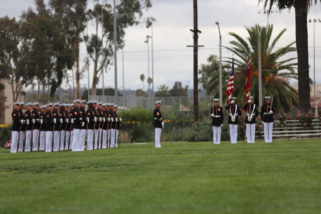 Marines with the official Marine Corps Color Guard prepare to present the colors during the Battle Color Ceremony aboard Marine Corps Air Station Miramar, Calif., March 11. The Battle Color Detachment is a ceremonial unit featuring the United States Marine Drum and Bugle Corps, the Silent Drill Platoon and the official Marine Corps Color Guard. “The Drum and Bugle Corps, and the Silent Drill Platoon puts on a fantastic show, ‘wows’ the crowd and represents the best the Marine Corps has to offer,” said Maj. Gen. Michael Rocco, commanding general of the 3rd Marine Aircraft Wing. The Battle Color Detachment is based out of Marine Barracks Washington, also known as “8th and I,” the oldest active post in the Marine Corps. The Marines in the detachment perform in hundreds of ceremonies across the country annually. (U.S. Marine Corps photo by Cpl. Kimberlyn Adams/Released)