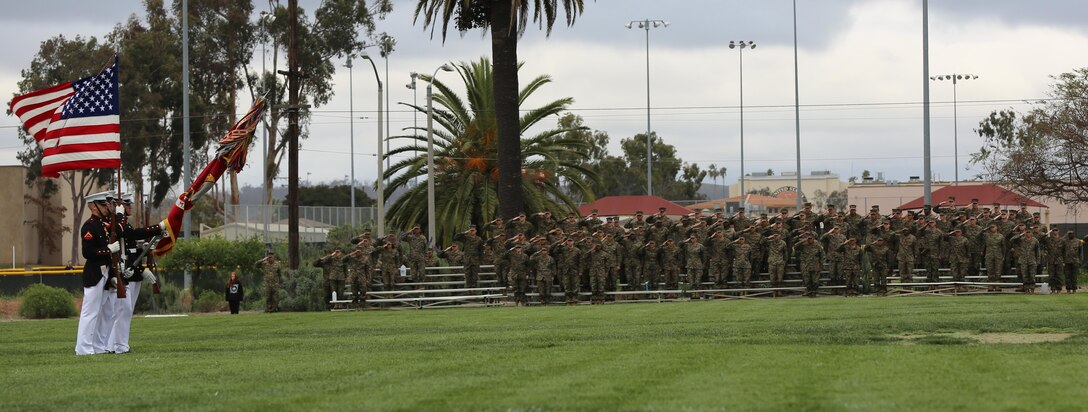 Marines with the official Marine Corps Color Guard present the colors during the Battle Color Ceremony aboard Marine Corps Air Station Miramar, Calif., March 11. The Battle Color Detachment is a ceremonial unit featuring the United States Marine Drum and Bugle Corps, the Silent Drill Platoon and the official Marine Corps Color Guard. “The Drum and Bugle Corps, and the Silent Drill Platoon puts on a fantastic show, ‘wows’ the crowd and represents the best the Marine Corps has to offer,” said Maj. Gen. Michael Rocco, commanding general of the 3rd Marine Aircraft Wing. The Battle Color Detachment is based out of Marine Barracks Washington, also known as “8th and I,” the oldest active post in the Marine Corps. The Marines in the detachment perform in hundreds of ceremonies across the country annually. (U.S. Marine Corps photo by Cpl. Kimberlyn Adams/Released)