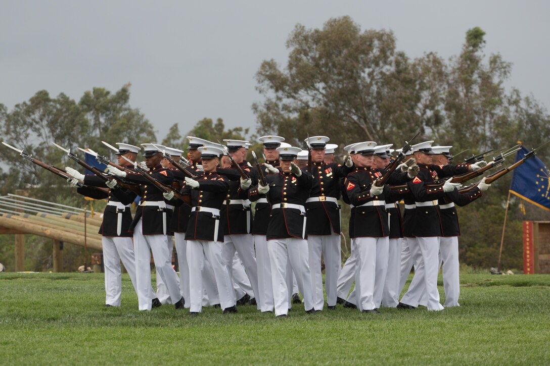 Marines with the Silent Drill Platoon perform aboard Marine Corps Air Station Miramar, Calif., March 11. Their performance was part of the Battle Color Ceremony aboard the air station. (U.S. Marine Corps photo by Sgt. Lillian Stephens/Released)