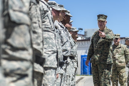 Marine Corps Gen. Joseph F. Dunford Jr., chairman of the Joint Chiefs of Staff, talks with troops while visiting Joint Task Force Guantanamo, Cuba, March 9, 2016, to observe the detention facility and meet with service members who support the mission. DoD photo by Navy Petty Officer 2nd Class Dominique A. Pineiro