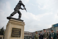 Marine Corps Gen. Joseph F. Dunford Jr., chairman of the Joint Chiefs of Staff, listens to a briefing about Colombia's involvement in the Korean War while visiting the Korean War memorial in Bogota, Colombia, March 10, 2016. DoD photo by Navy Petty Officer 2nd Class Dominique A. Pineiro